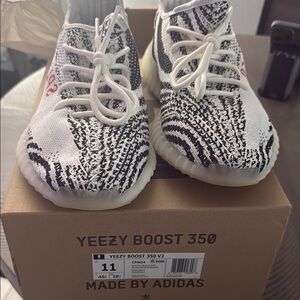 Adidas Black and White Sneakers with Boost Cushioning